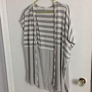 Sleeveless shawl type cover